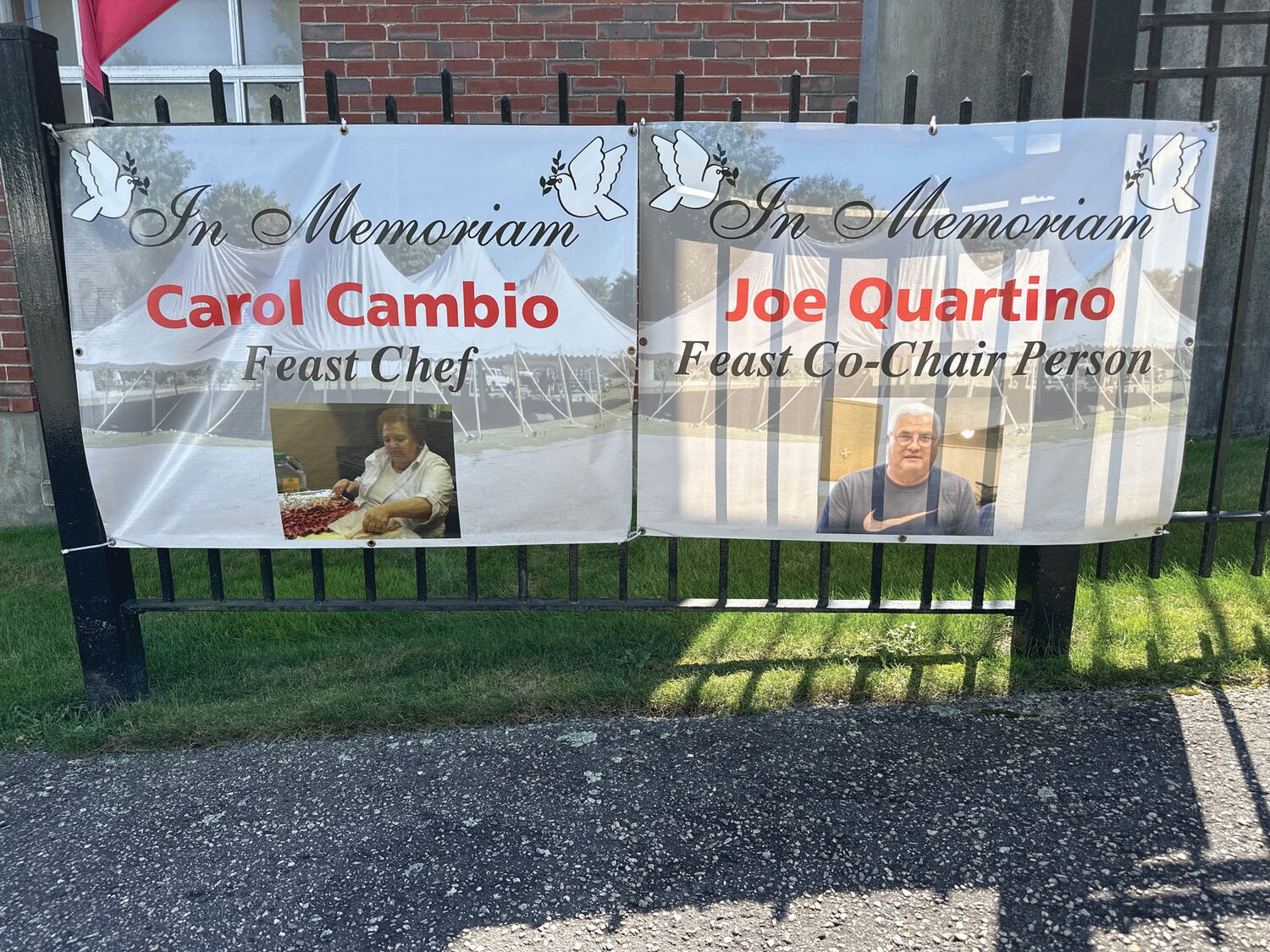 MIGHTY MEMORIALS: These are two of the impressive banners festival-goers will see that remember and salute the last Co-Chairman Joe Quartino and Chef Carol Cambio.